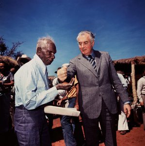 Prime Minister Gough Whitlam pours soil into the hands of traditional land owner Vincent Lingiari, Northern Territory, 1975, printed 1999 by Mervyn Bishop