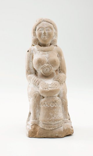 This work, *Rattle in the form of a lady playing the drum* 2nd century BCE – 1st century BCE, was purchased by the Art Gallery in 1994 from Art of the Past and de-accessioned in 2022 for return to India.